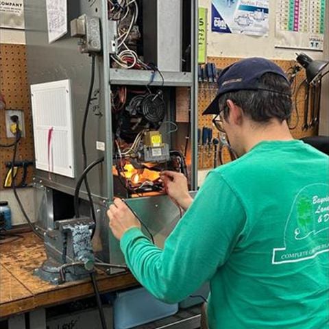 Hands-on troubleshooting at an HVAC training station