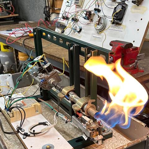 Live combustion demonstration on HVAC training equipment