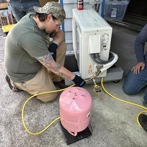 Simulated field service call inside the HVAC training lab